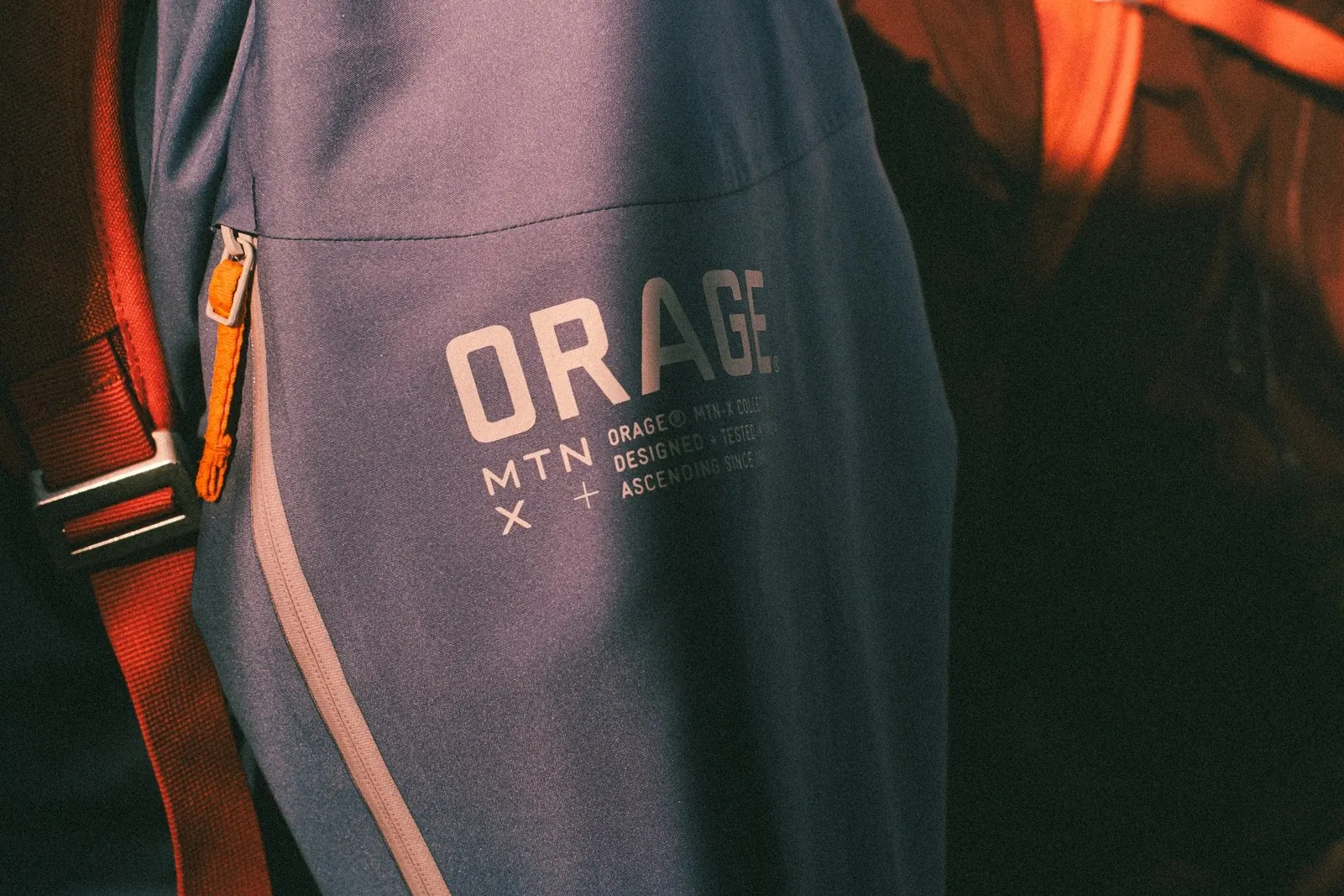 Sleeve of an Orage MTN-X jacket with logo and the text Designed and tested in Canada
